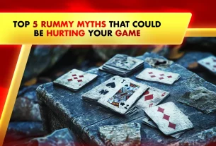 rummy playing cards on blue table