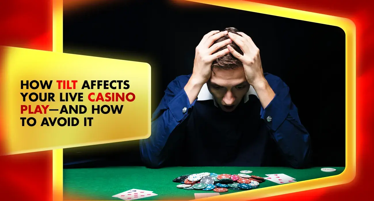 man holding his head on a live casino table with poker chips and playing cards
