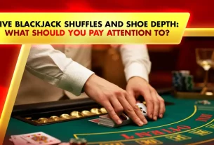 dealers hands on a live blackjack table with poker chips and playing cards