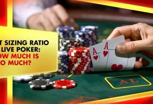 stack of chips and playing cards with two red aces that inspire online live poker playing ambience